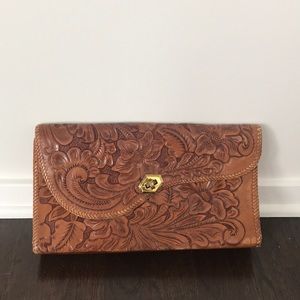 Brown leather clutch